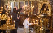Lighting candles - Photo By Jeroen Kransen